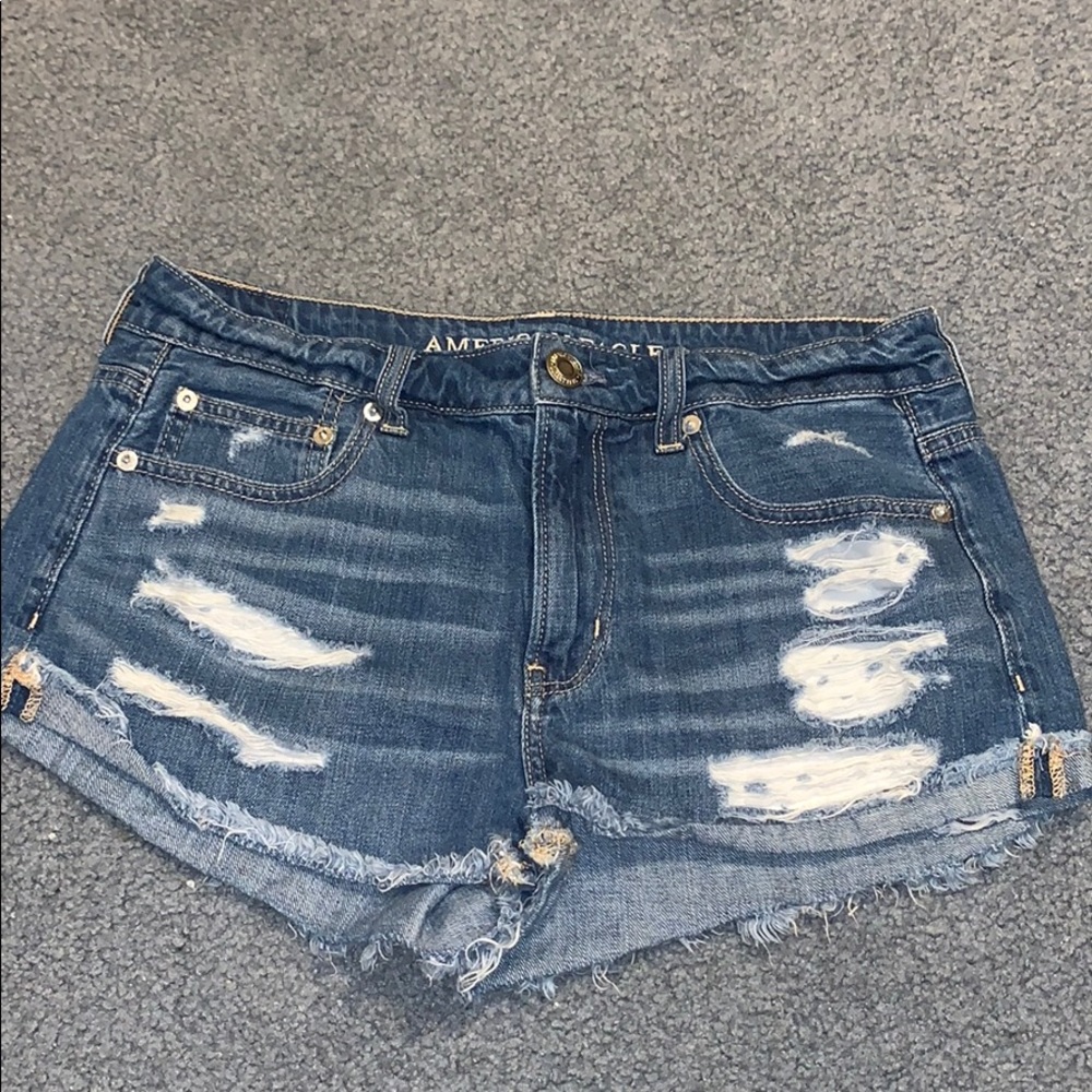 blue distressed american eagle shorts